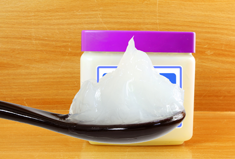 Petroleum jelly is an excellent base to protect your scalp from the chemicals in your relaxer.